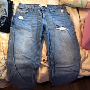 Two pairs of garage mid-waisted Capri jeans